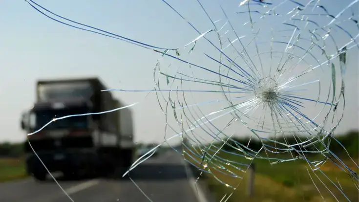 Close up of cracked car windscreen